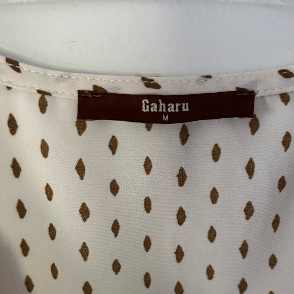 Chic Cream Sleeveless Ruffle Blouse - Picture 2 of 3